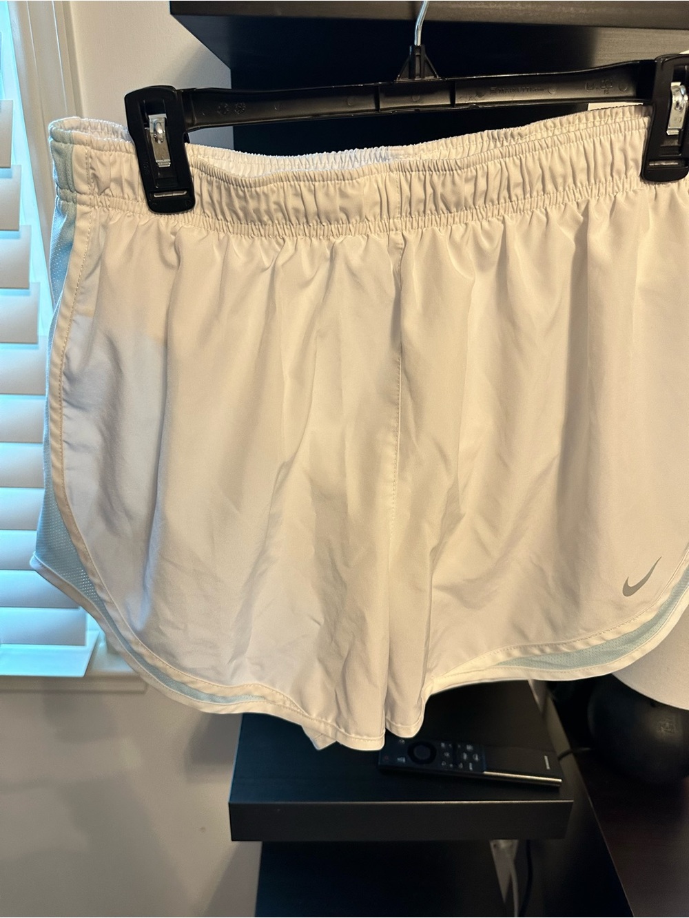 Nike Women's White Athletic Running Shorts with Subtle Silver Swoosh
